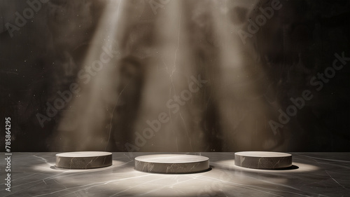 Three Cylinder Pedestal on a Dark Cement Background with Shining Spotlight photo