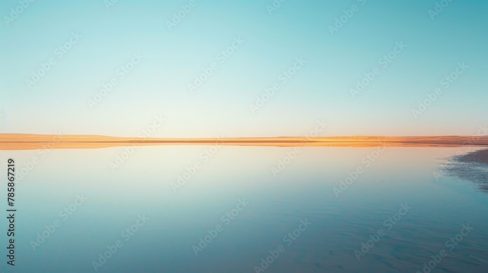 Abstract desert reflections: a minimalist shot of a mirage shimmering on the horizon.