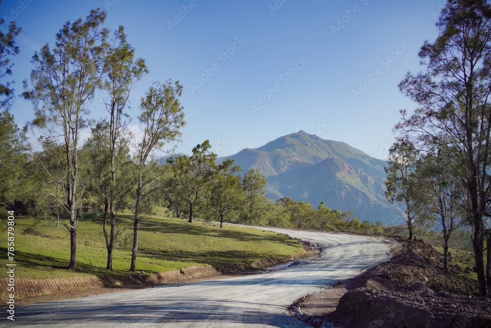 View of contryroad with beautiful hill background.