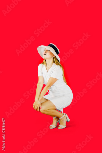 Fashionable confident woman wearing sunglasses and hat