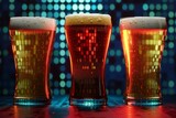 Glasses of beer on the bar counter with bokeh background