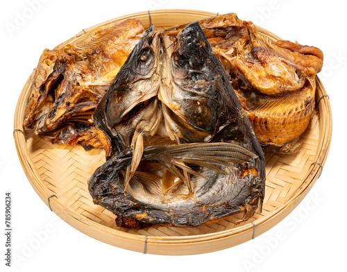 Dried fish in basket isolated on white background, Dried fish on White Background PNG file. © MERCURY studio