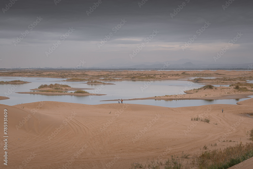 The river going through the desert in Wuhai, Inner Mongolia, China