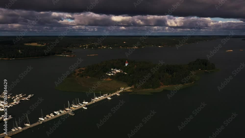 Aerial view circling the Moomin island, dramatic clouds above Naantali, Finland Aerial view circling the Moomin island, dramatic clouds above Naantali, Finland