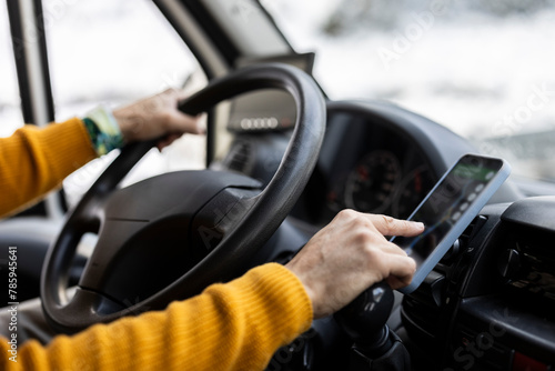 Driver Navigating Winter Roads with GPS Technology