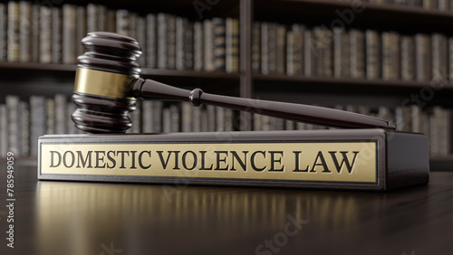 Domestic violence law: Judge's Gavel as a symbol of legal system and wooden stand with text word on the background of books