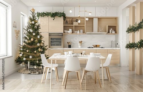 Christmas tree and garland in modern kitchen with dining table  white chairs  light wood cabinets  neutral color scheme  white walls  beige floor