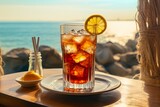 
Dirty Soda served in antique glassware against a beautiful seascape with bright sunbeams