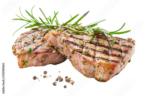 Two grilled tuna steak with rosemary and spices
.isolated on white background