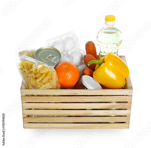 Wooden crate with donation food isolated on white