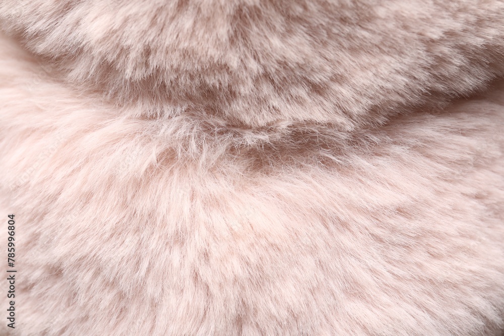Obraz premium Texture of pink faux fur as background, closeup