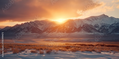 Majestic view of snow-capped mountains with the warm glow of sunset  conveying beauty and tranquility in nature