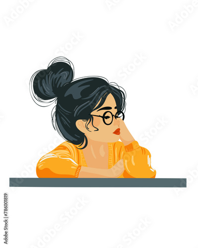Young woman with glasses at the table resting her chin on her hand