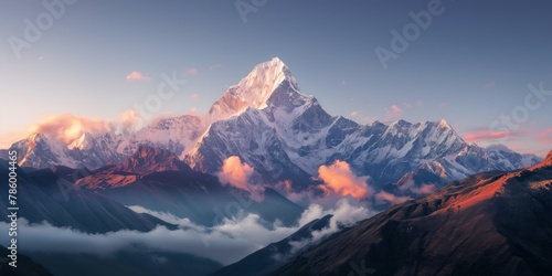 An awe-inspiring mountain peak bathed in the golden light of sunrise, symbolizing adventure and the grandeur of nature