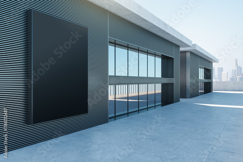 Sleek architectural facade with a large mockup space, perfect for advertising against a city skyline. 3D Rendering © Who is Danny