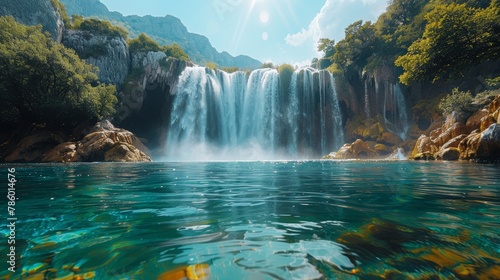 Stunning view of the Kravica Waterfall in Bosnia showing cascading waters, lush greenery, and rocky formations illuminated by sunlight. photo