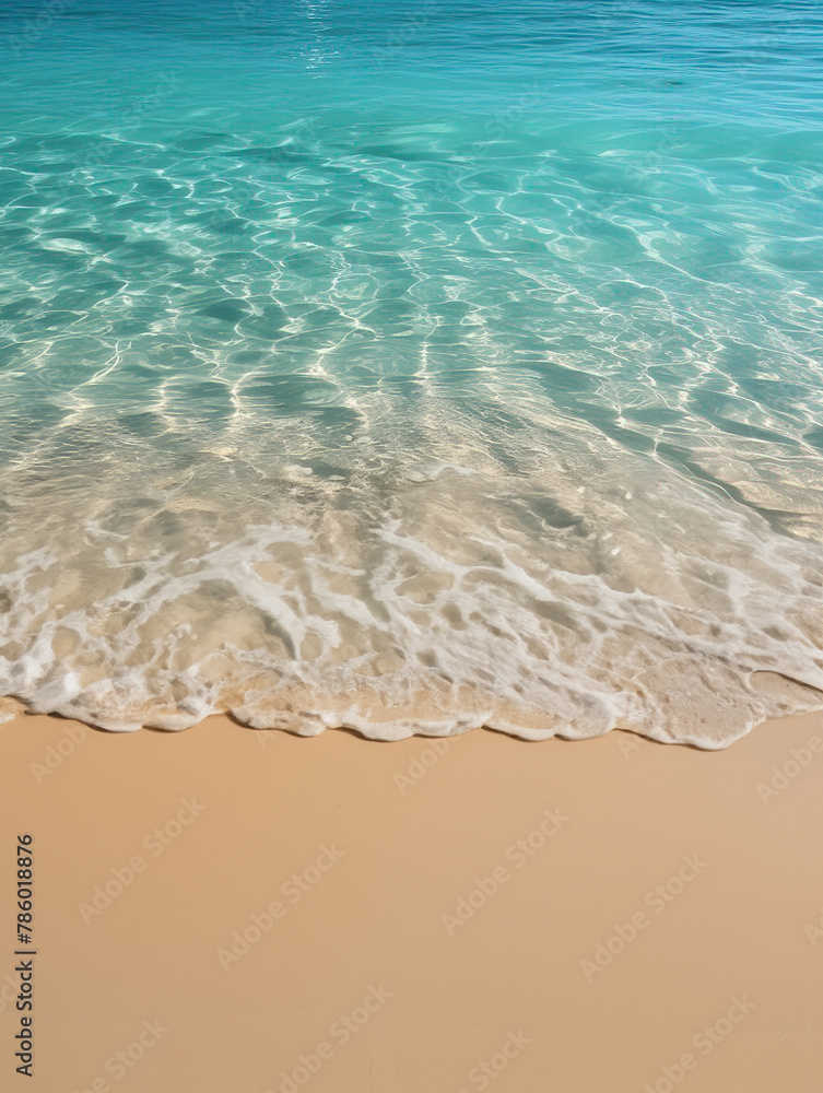 waves on the sand.Beautiful beach, white waves crashing, summer beach with clear sky, blue sea water.Vertical.Summer beach trip. waves on the sand.Beautiful beach, white waves crashing, summer beach with clear sky, blue sea water.Vertical.Summer beach trip.