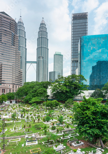 Photography Jalan Ampang Muslim Cemetery,in the heart of KL City,overlooked by tall modern buildings,Kuala Lumpur,Malaysia
