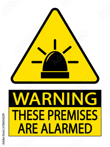 Warning, these premises are alarmed. Yellow triangle sign with silhouette of alarm siren sounding and text below.