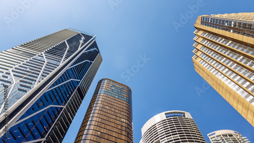 Highrise modern architecture in Sydney, New South Wales, Australia. Blue sky background with space for text.