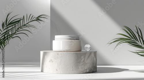 White cream jar on pedestal on neutral gray background with palm branches. Presentation of cosmetic products, mockup