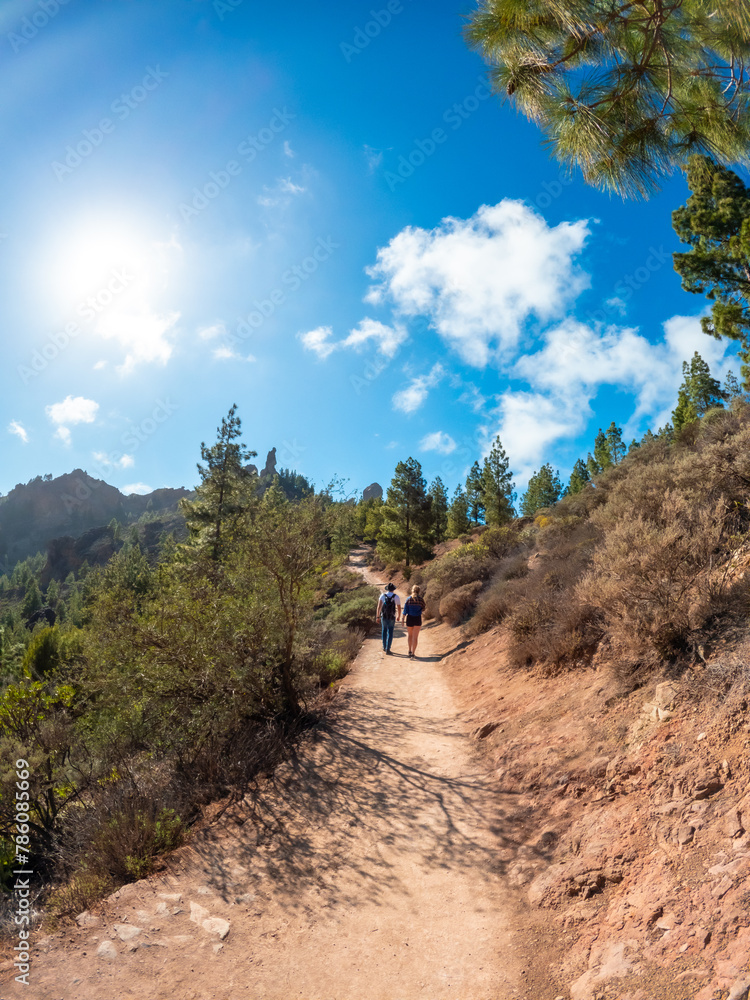 A couple of hikers on the trail up to Roque Nublo in Gran Canaria, Canary Islands