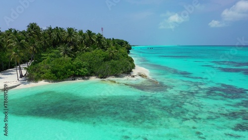 Fototapeta Naklejka Na Ścianę i Meble -  Aerial view of the beautiful turquoise ocean in the Maldives