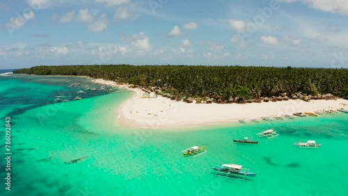 Travel concept: sandy beach on a tropical island by coral reef atoll from above. Daco island, Philippines. Summer and travel vacation concept photo