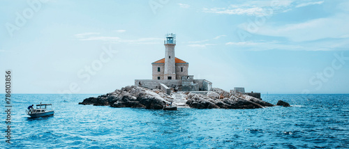 Panoramic view of a beautiful lighthouse in the mediterranean sea of Croatia in a sunny day during summer.