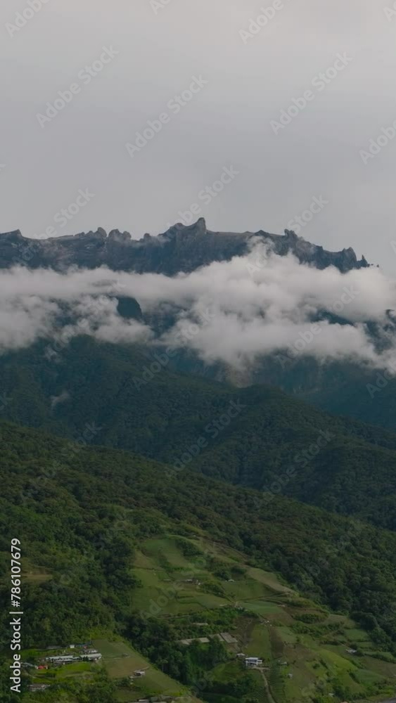 Top view of mount Kinabalu is situated in Sabah of the Island, and is the highest mountain in Malaysia. Vertical video. Top view of mount Kinabalu is situated in Sabah of the Island, and is the highest mountain in Malaysia. Vertical video.