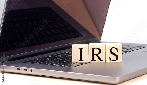 Billede på lærred IRS word on wooden block on laptop , business concept