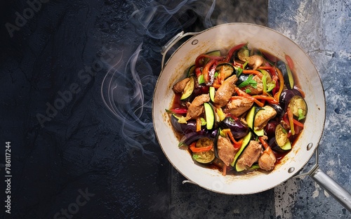 Stir fry with chicken, eggplant, zucchini and sweet peppers