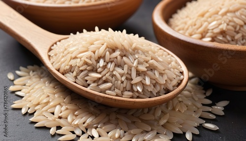 Brown rice is a whole grain rice with the inedible outer hull removed photo