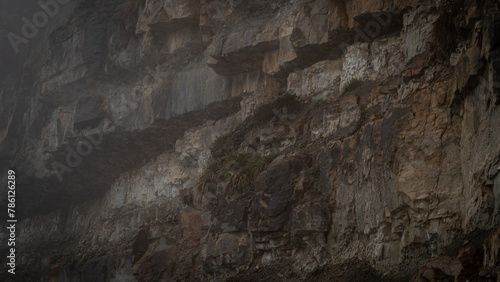 .Stone scale background - a textured surface of various-sized stones