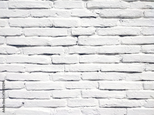 Photo of a white rustic brickwall background. 