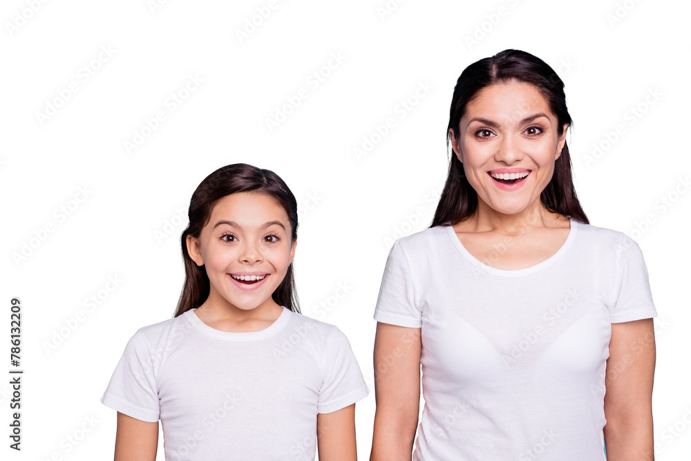 Close up photo pretty two people brown haired mum small little daughter eyes mouth opened facial expression delighted sale discount wearing white t-shirts isolated bright blue background Close up photo pretty two people brown haired mum small little daughter eyes mouth opened facial expression delighted sale discount wearing white t-shirts isolated bright blue background