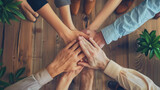 Business team with hands together - teamwork concepts