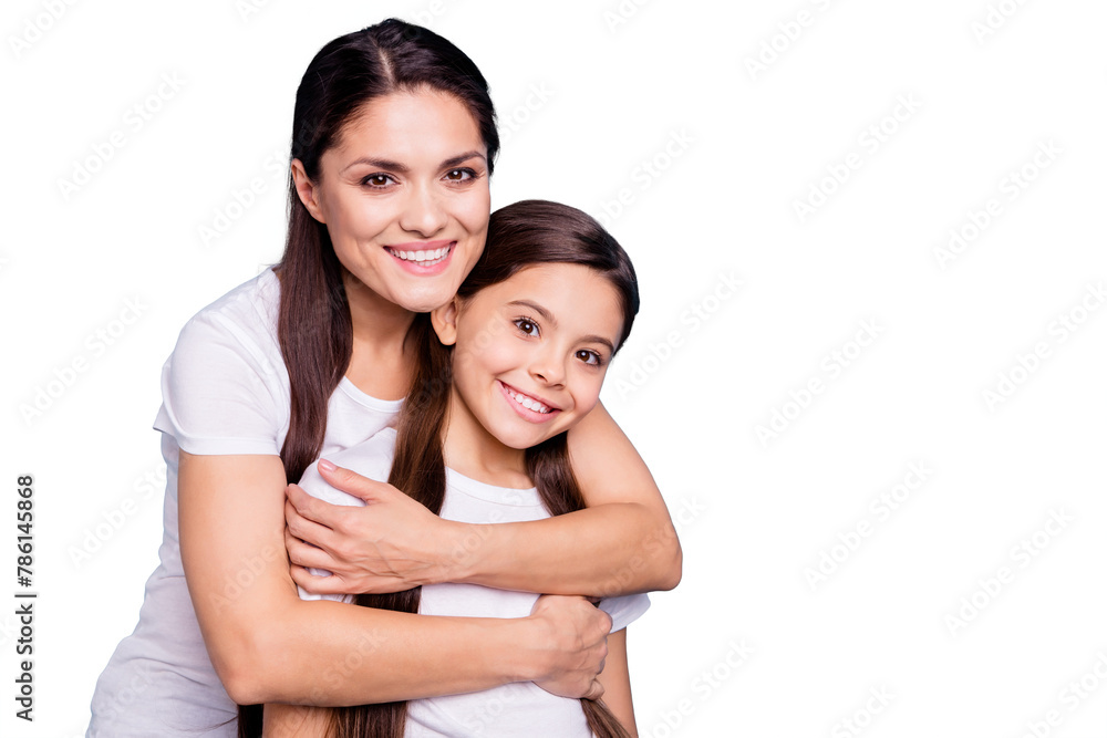 Close up photo pretty two people brown haired mum small little daughter best friends stand hugging piggy back lovely nice free time rejoice wearing white t-shirts isolated on bright blue background Close up photo pretty two people brown haired mum small little daughter best friends stand hugging piggy back lovely nice free time rejoice wearing white t-shirts isolated on bright blue background