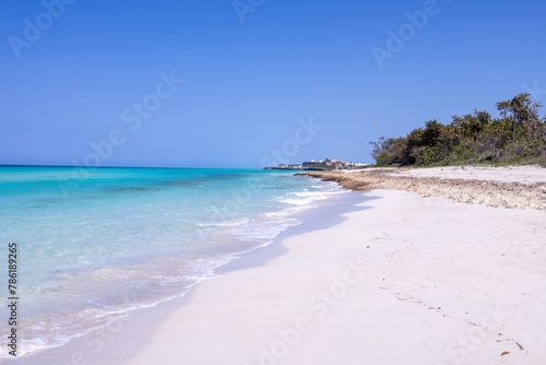 The beautiful beach front of the Cuban town of Varadero in Cuba showing the sandy beach on a sunny summers day