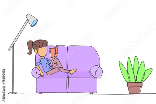 Continuous one line drawing girl sitting stretched out on the sofa reading a book. Really like the content of the book reading on each page. Impressive. Single line draw design vector illustration