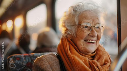 Happy elderly lady on the bus photo