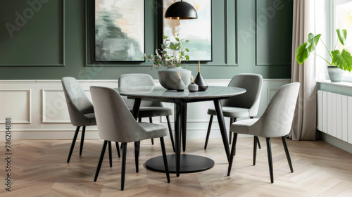 A modern dining room with a round table and six chairs