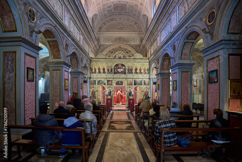 Easter mass at Biserica San Salvatore alle Coppelle, Romanian medieval church in Rome, Italy photo