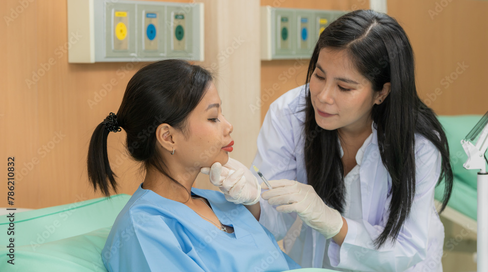 Banner of Woman Doctor Gently use hand syringe careful inject iller Botox liquid through skin patient for cosmetic beauty at cosmetic surgery department in hospital clinic. Banner of Woman Doctor Gently use hand syringe careful inject iller Botox liquid through skin patient for cosmetic beauty at cosmetic surgery department in hospital clinic.