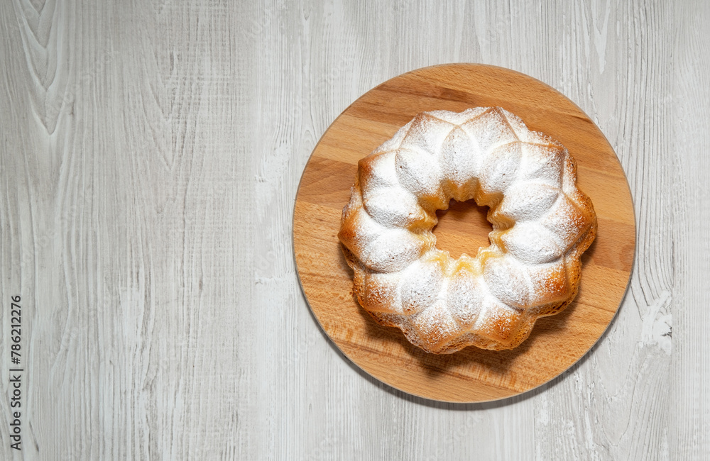 Homemade cupcake on a light wooden table Homemade cupcake on a light wooden table
