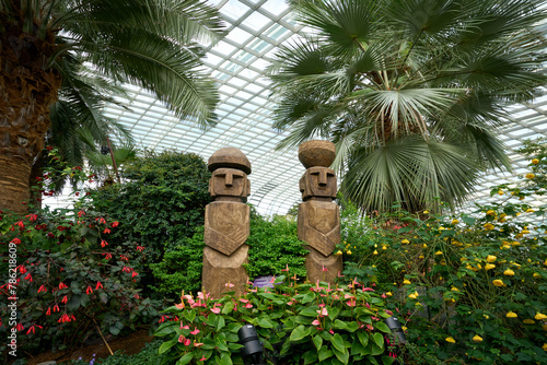 Wooden totems in the greenhouse