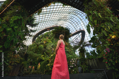 Young woman looking at the cloud forest in Singapore