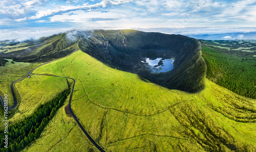 Azores, Faial island - Aerial view from drone to green volcano Caldeira at sunrise, Portugal