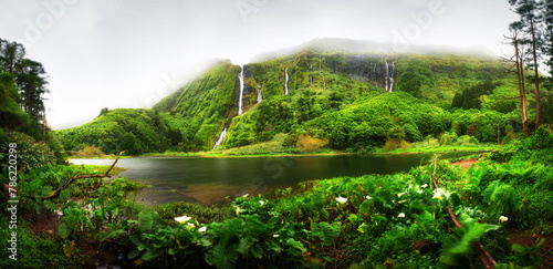 Panorama of Ribeira do Ferreiro waterfalls, green paradise hidden in Flores Island, Azores, Portugal © TTstudio