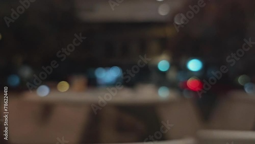 Wallpaper Mural blurred Defocused road with cars passing at night  seen from a coffee shop Torontodigital.ca